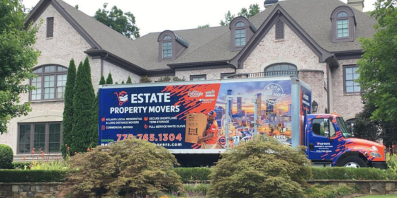 Long distance movers in Fulton County, Estate Property Movers moving truck outside of a house