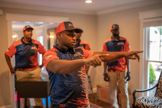 Men Standing in House Pointing as Local Movers in Smyrna, GA