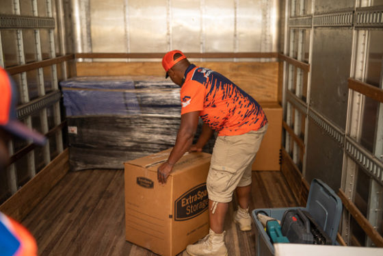 Man in Truck with Box as a Commercial and Office Mover in Fulton County, GA