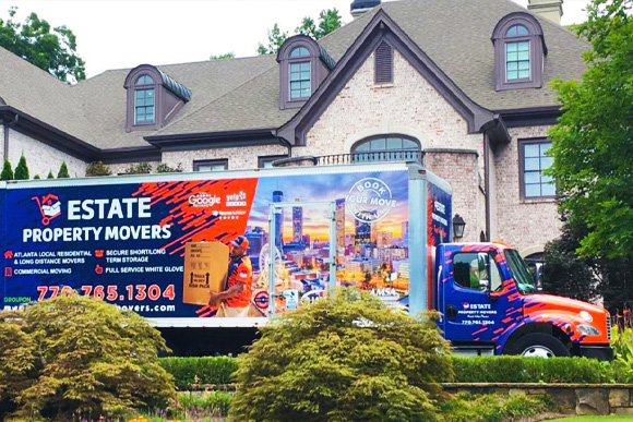 Moving truck parked outside of home with movers in Atlanta