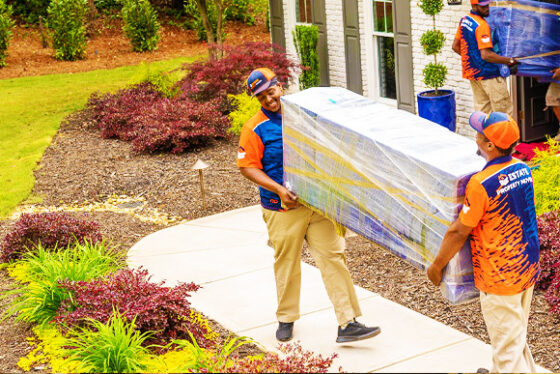 Local movers in Katy, TX moving heavy furniture outside