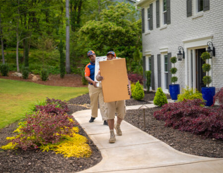 Full-Service Movers Moving Boxes Out of Home in Cumming, GA