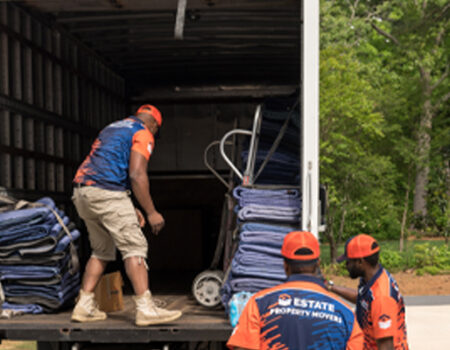 professional movers loading up a moving van while providing services such as Corporate Movers and Relocation Services in Douglasville, GA