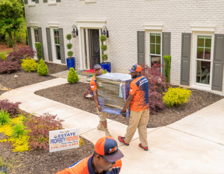 workers carrying furniture while providing services like Full Service Movers, Interstate Mover, Local Movers, and Moving Company in Peachtree Corners, GA