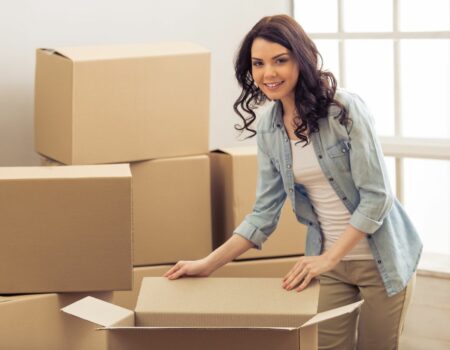 Young Woman with Boxes Needing College Movers in Atlanta, Brookhaven, Buckhead, Marietta, Sandy Springs, Smyrna